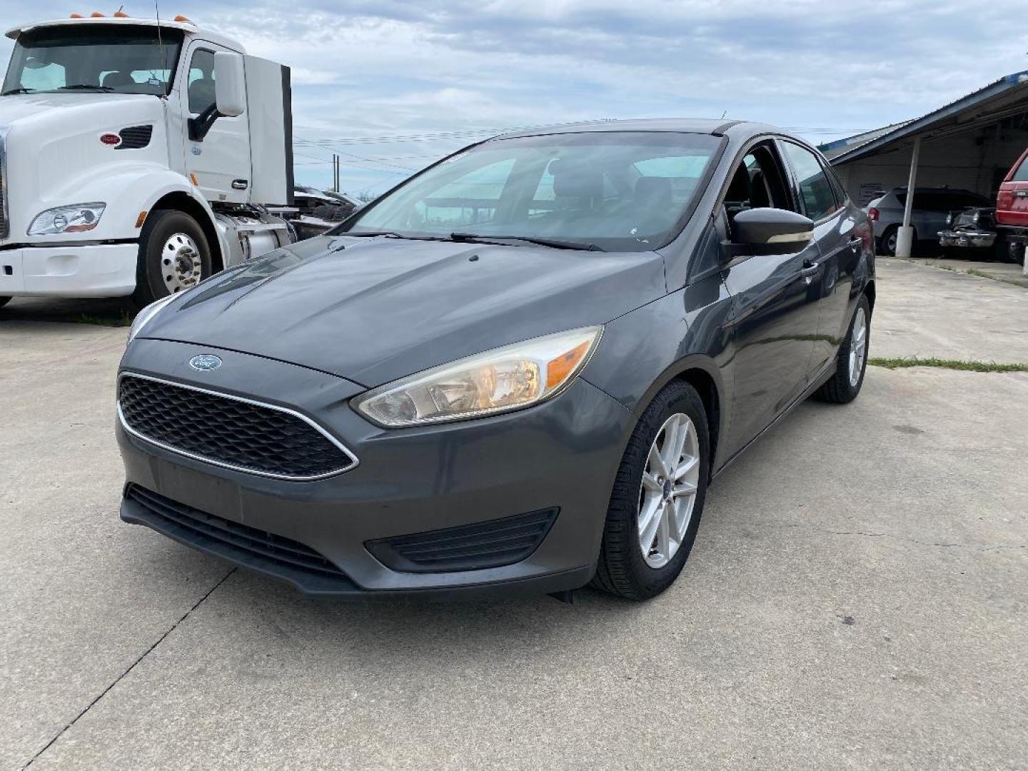 2017 Grey /Black Ford Focus (1FADP3F2XHL) , located at 1687 Business 35 S, New Braunfels, TX, 78130, (830) 625-7159, 29.655487, -98.051491 - Photo#0